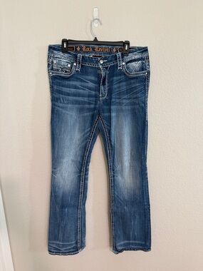 Rock Revival Women’s “Beliss” Faded Blue Boot Cut Jeans